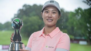 Xiyu Lin with the Aramco Team Series Hong Kong trophy