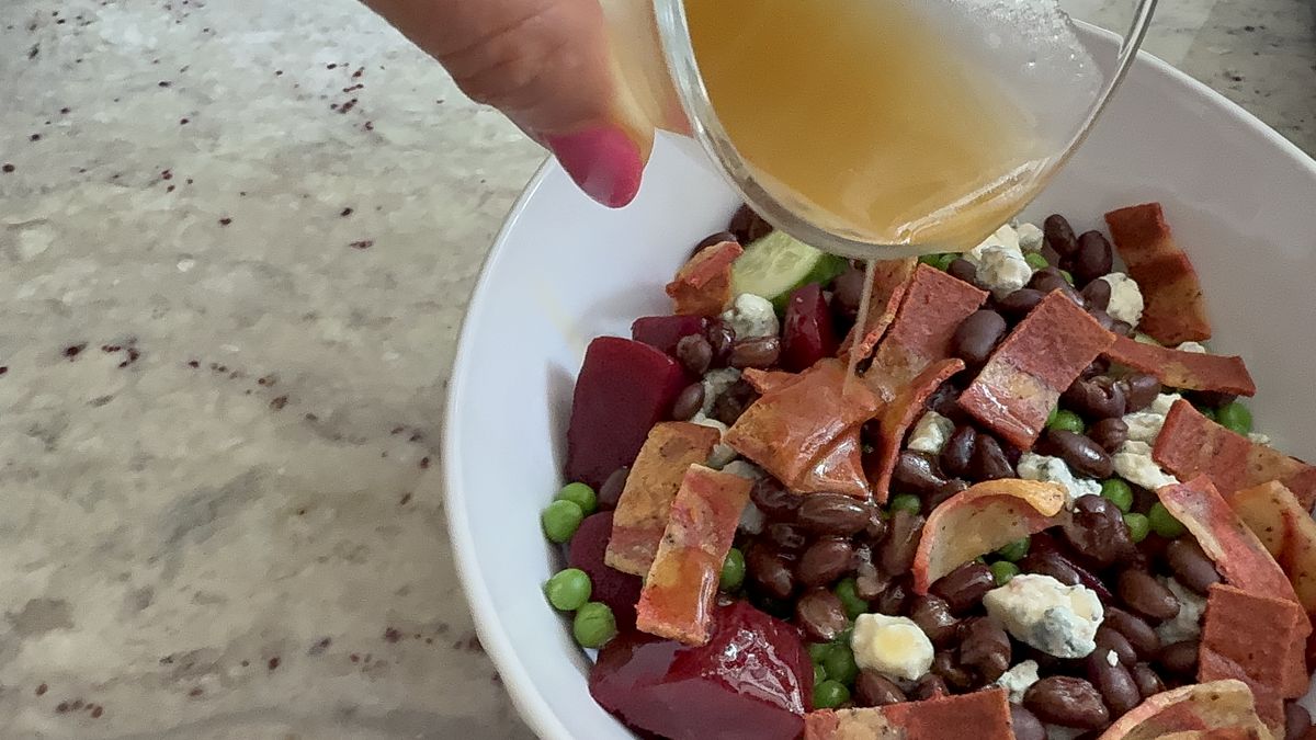 Terra Kaffe Aero making salad dressing