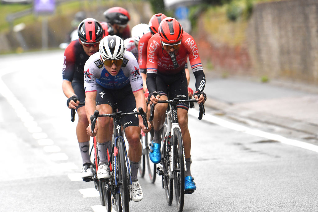 OVERIJSE BELGIUM APRIL 13 LR Remco Evenepoel of Belgium and Team QuickStep Alpha Vinyl and Warren Barguil of France and Team Arka Samsic compete in the breakaway during the 62nd De Brabantse Pijl La Flche Brabanonne 2022 Mens Elite a 2051km one day race from Leuven to Overijse BP22 on April 13 2022 in Overijse Belgium Photo by Luc ClaessenGetty Images