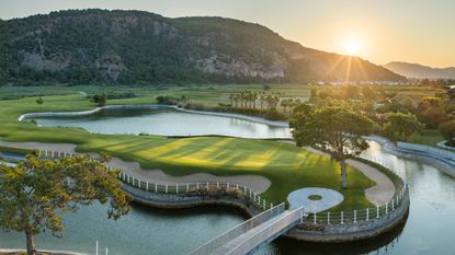 A green at Hilton Dalaman seen with mountains in the background