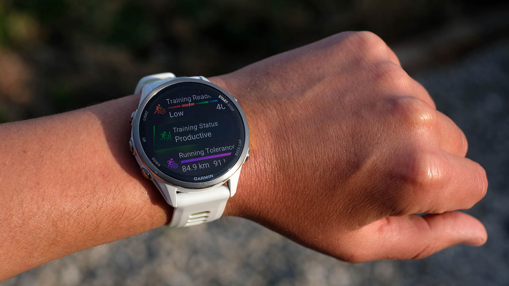 A close-up picture of our reviewer testing the Garmin Forerunner 970