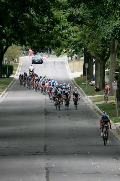 A lone rider slips off the front of the women's field.