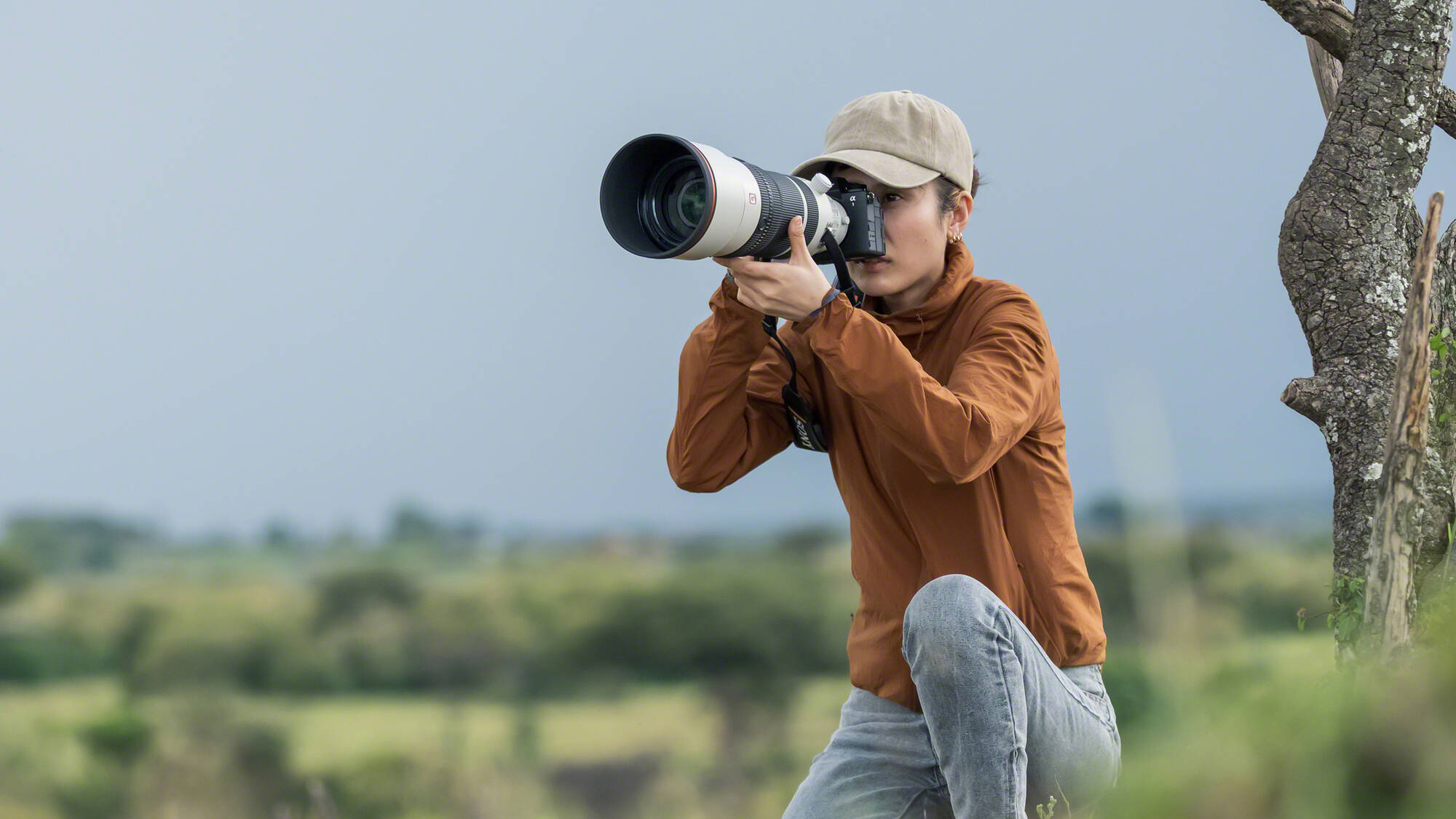 Sony FE 100-400mm f/4.5 GM OSS being used by a photographer outdoors