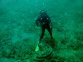 Divers explore what was thought to be an archaeological site off the island of Zakynthos, Greece.