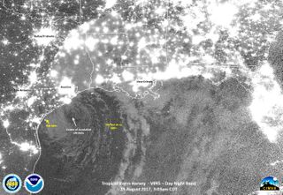 The NASA-NOAA Suomi NPP satellite captured this nighttime image of the Gulf of Mexico, Texas and Louisiana on Aug. 29 at 3:03 a.m. Tropical Storm Harvey's center is identified over the Gulf.