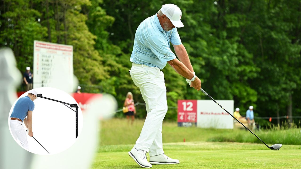 Darren Clarke hits a driver off the tee