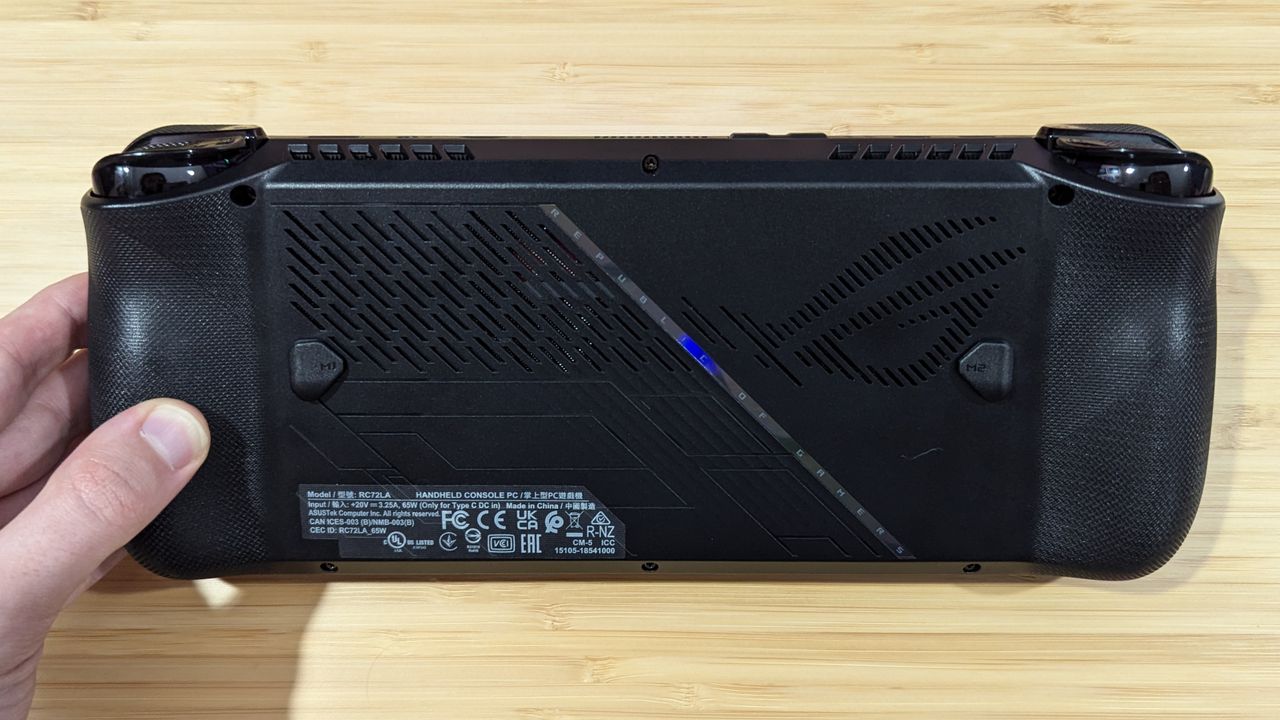 The back of the Asus ROG Ally X, highlighting its bumpers, triggers, and additional back buttons.