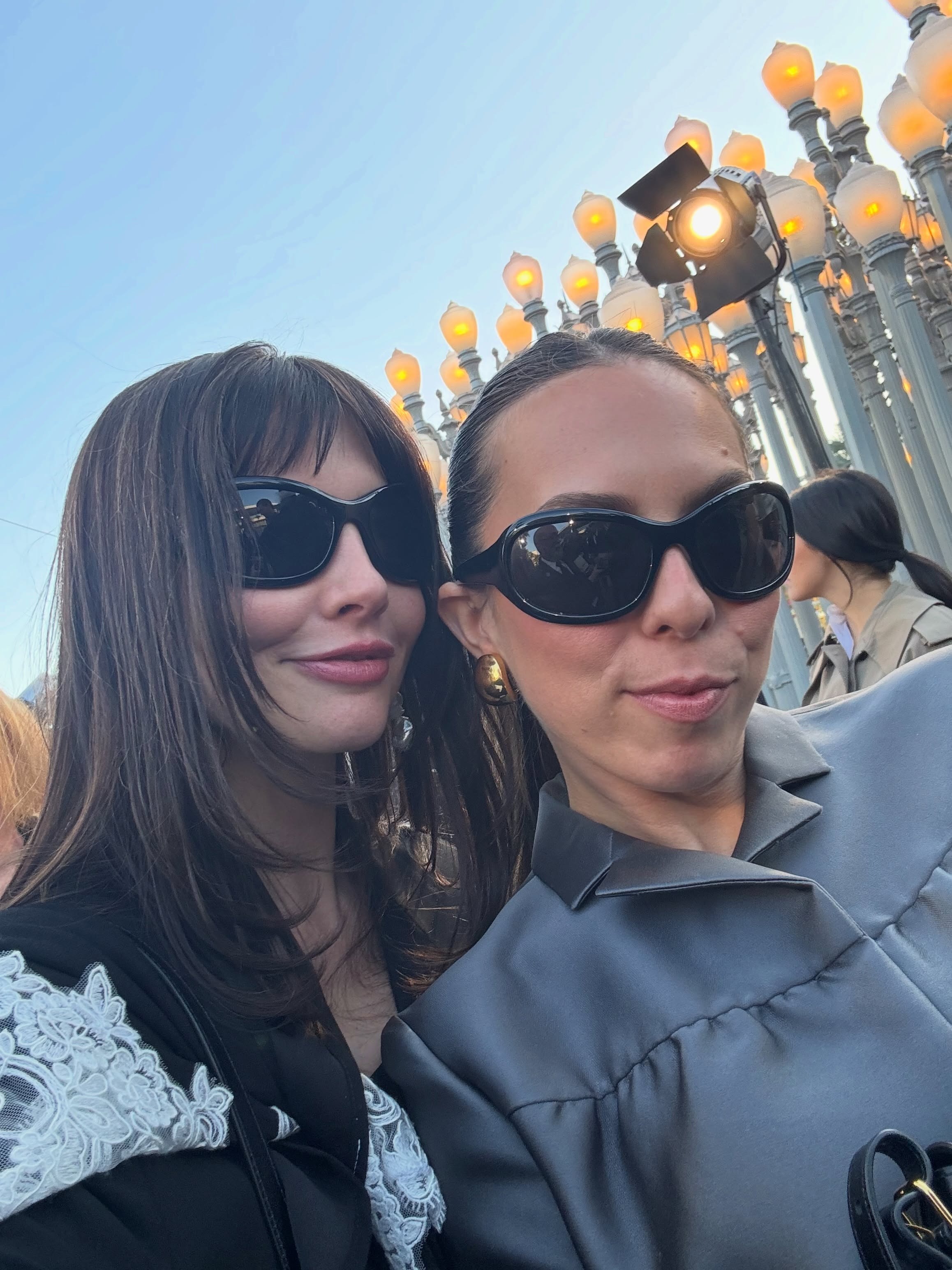 Woman wearing luxury bug-eye sunglasses.