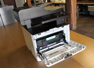 The front of the Samsung ProXpress C3060W opens, letting you easily access the toner.