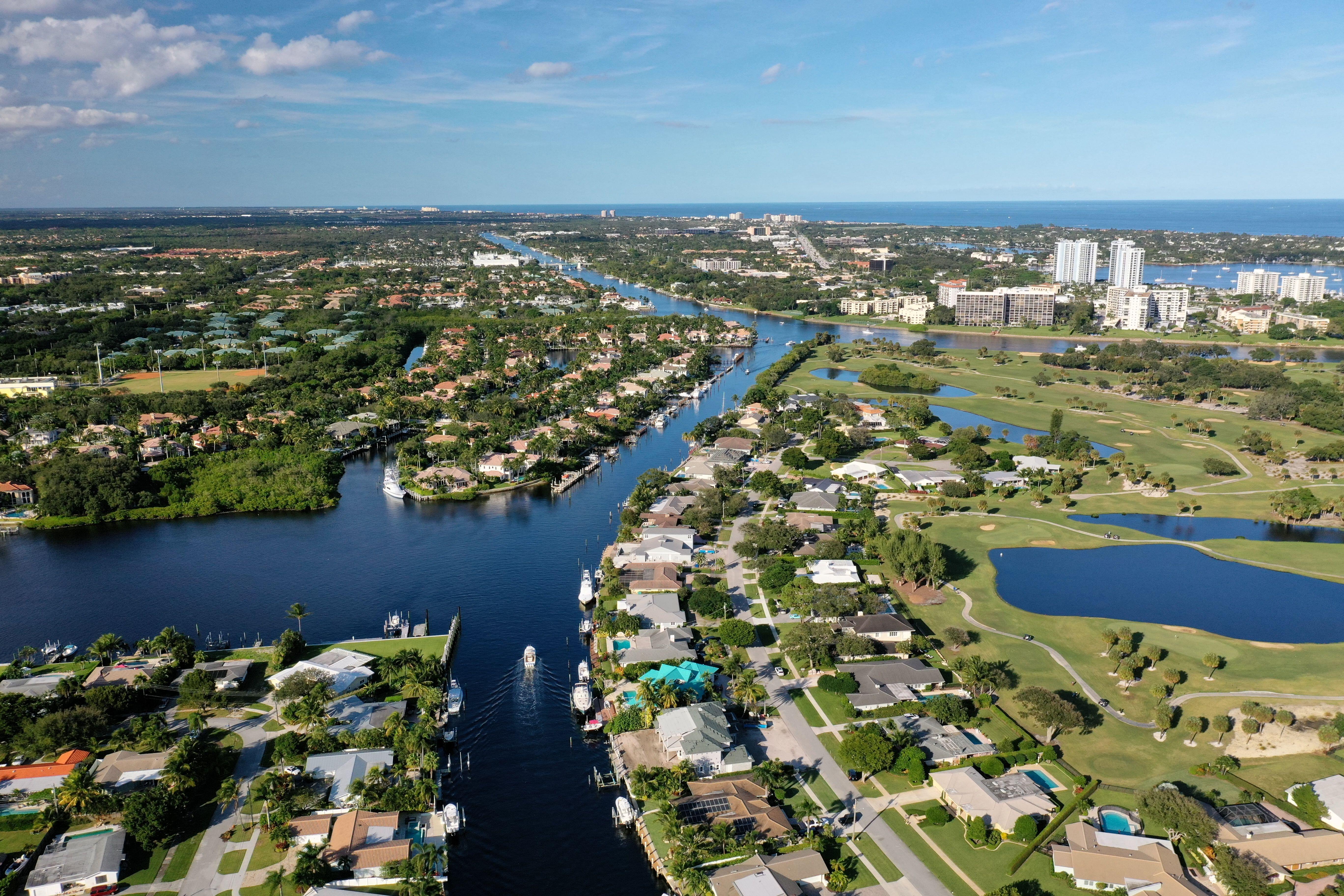 Aerial view of Palm Beach houses on the water's edge