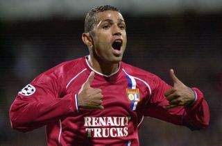Sonny Anderson celebrates after scoring for Lyon against AC Milan in 2002.