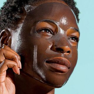 A woman with the Image Skincare I Mask on her face