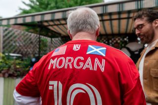New York Red Bulls fan Andrew Pollock shows off his signed Lewis Morgan shirt which reads: ‘To Scots-American, THANK YOU!’ and features a St Andrews cross