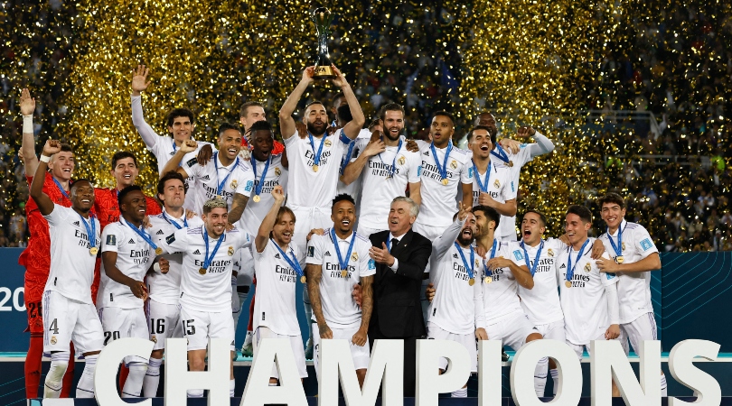 Real Madrid players celebrate with the trophy after winning the FIFA Club World Cup in Morocco in February 2023.