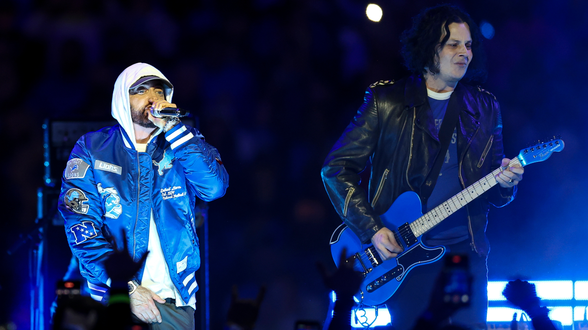 Eminem and Jack White perform during halftime of a Thanksgiving NFL football game between the Detroit Lions and the Green Bay Packers at Ford Field on November 27, 2025 in Detroit, Michigan