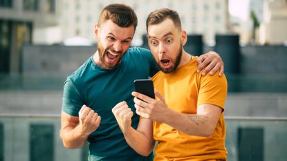 Football fans happy watching the game