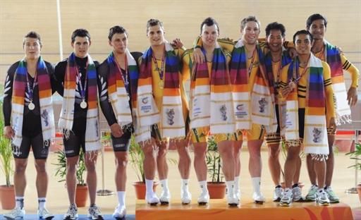 The Australian, New Zealand and Malaysian teams on the podium after the team sprint.