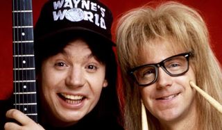 Wayne's World Mike Myers and Dana Carvey goof off with instruments