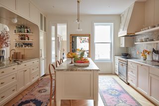 Cream kitchen with island and runners