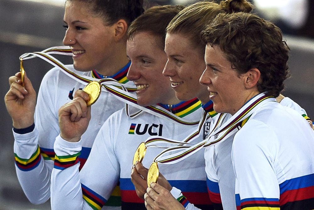 Chloe Dygert, Kelly Catlin, Jennifer Valente and Kimberly Geist celebrate with their gold medals after winning the Women's Team Pursuit final at the 2017 Track Cycling World Championships