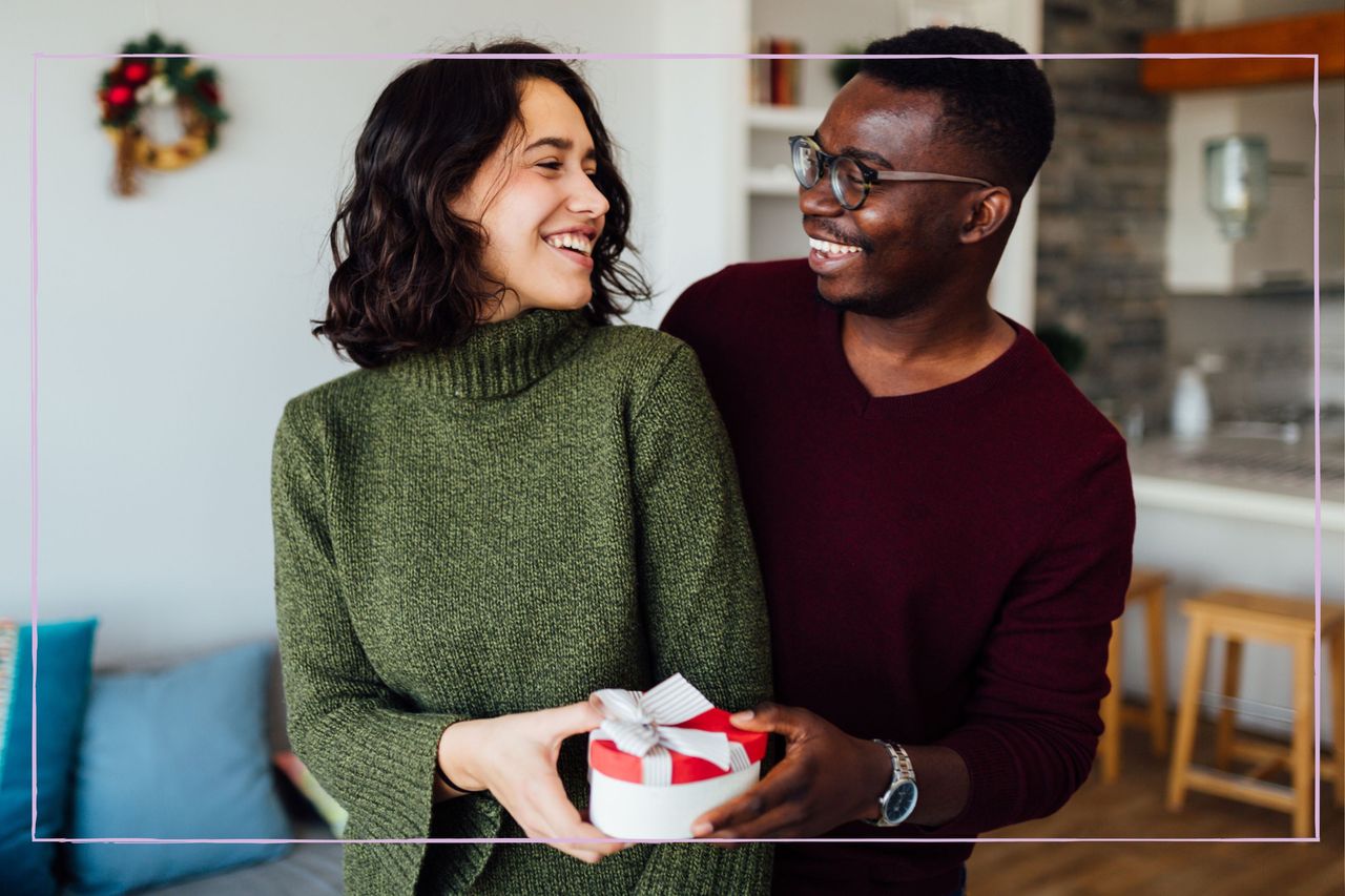 Couple celebrating Valentine&#039;s Day at home