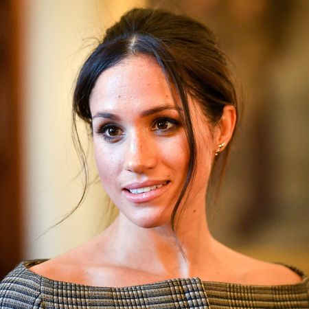 Meghan Markle off the shoulder shirt hair up
