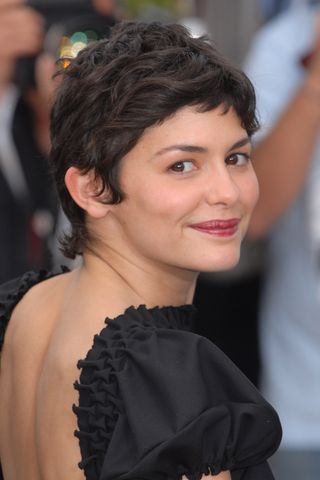 Audrey Tautou has a curly pixie cut during 2006 Cannes Film Festival - "The Da Vinci Code" Photo Call at Palais du Festival in Cannes, France, France.