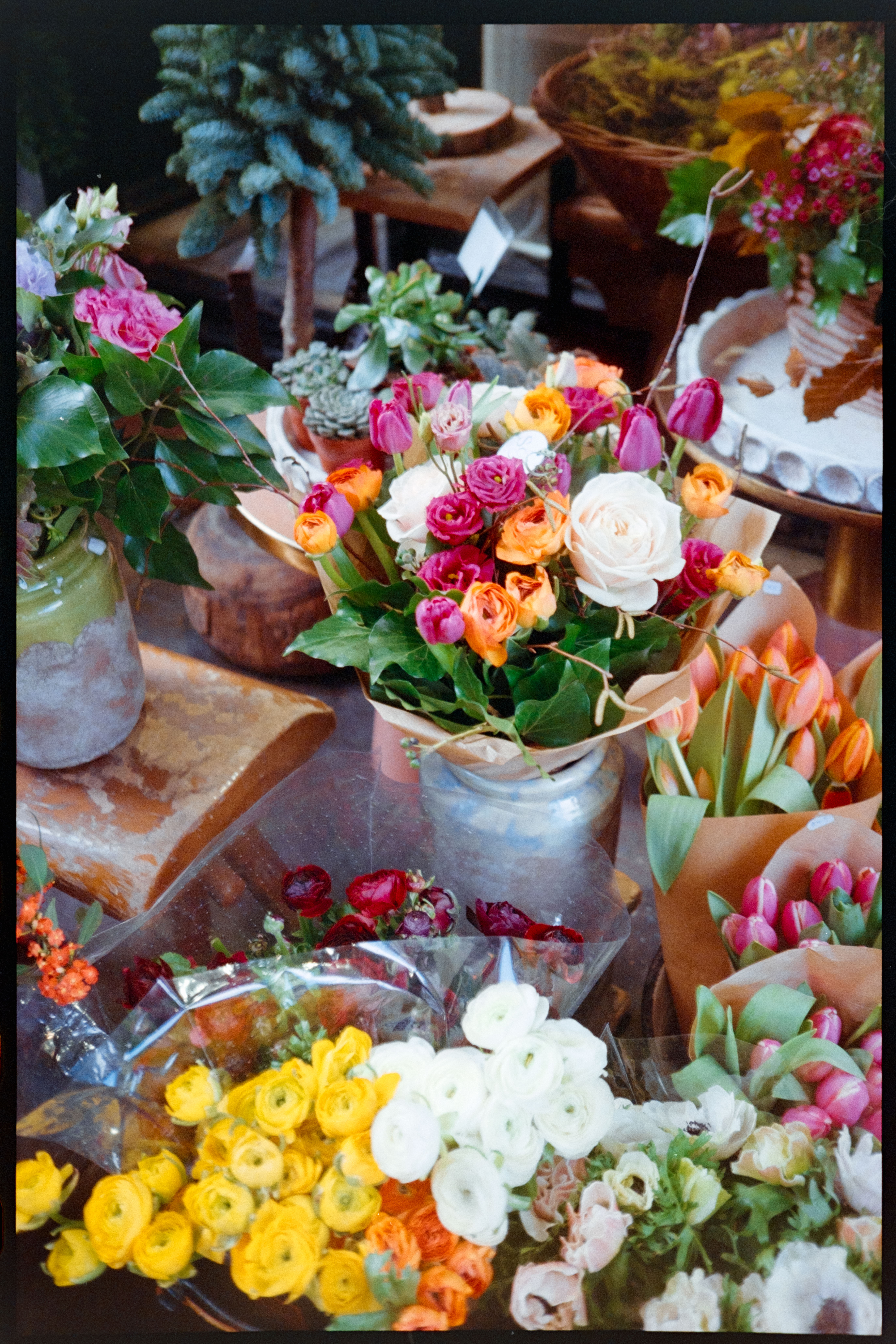 Flowers in a florist store window display