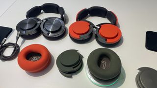 Dyson OnTrac headphones with red, green and silver finishes