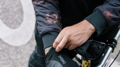 Best winter cycling gloves: Pictured here, a person putting on cycling gloves 