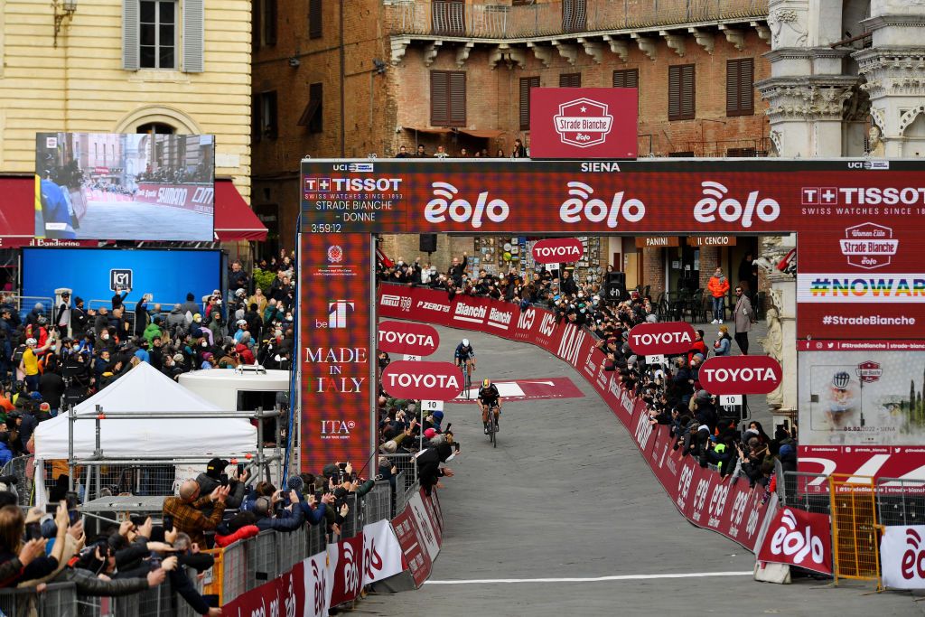 SIENA ITALY MARCH 05 A general view of Lotte Kopecky of Belgium and Team SD Worx sprint to win ahead of Annemiek Van Vleuten of Netherlands and Movistar Team during the Eroica 8th Strade Bianche 2022 Womens Elite a 136km one day race from Siena to Siena Piazza del Campo 321m StradeBianche on March 05 2022 in Siena Italy Photo by Luc ClaessenGetty Images