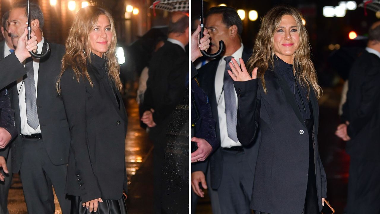 Composite of two pictures of Jennifer Aniston wearing a black blazer, satin skirt and heeled boots in New York in 2019