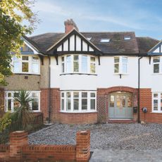 1930s semi detached property with render and pebbled drive