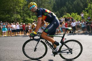 Alejandro Valverde climbs through a switchback during stage 14.