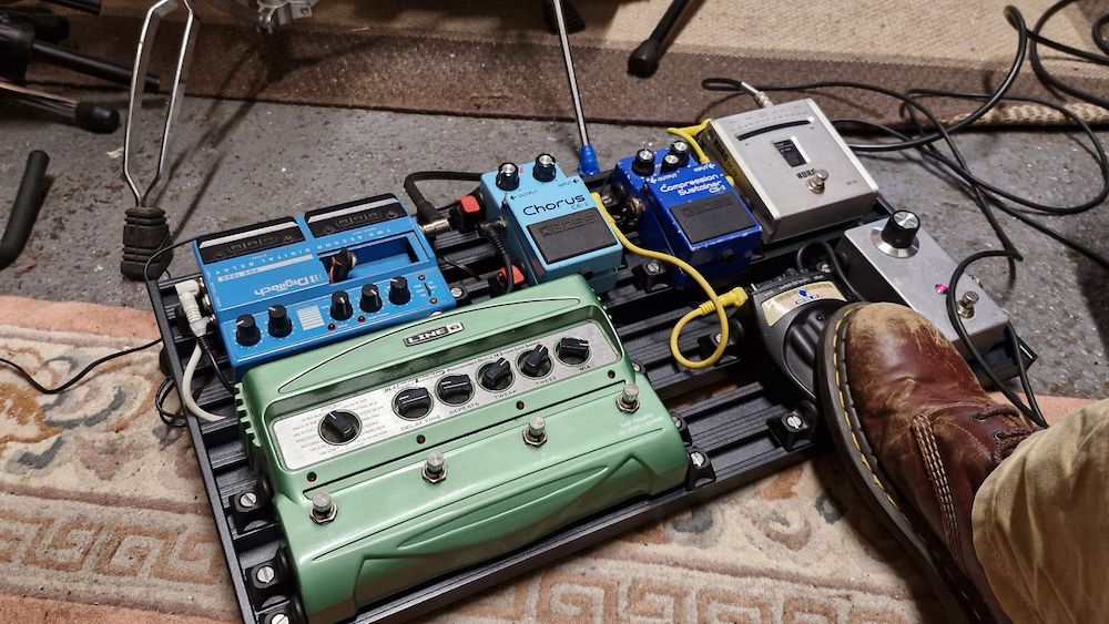 The Aclam Smart Track S2 on the floor with pedals attached