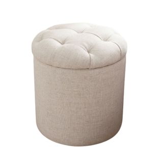 A white dorm storage ottoman with a tufted button lid