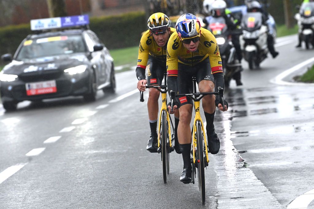 WEVELGEM BELGIUM MARCH 26 LR Christophe Laporte of France and Wout Van Aert of Belgium and Team JumboVisma compete passing through a Kemmelberg cobblestones sector during the 85th GentWevelgem in Flanders Fields 2023 Mens Elite a 2609km one day race from Ypres to Wevelgem UCIWT on March 26 2023 in Wevelgem Belgium Photo by Tim de WaeleGetty Images