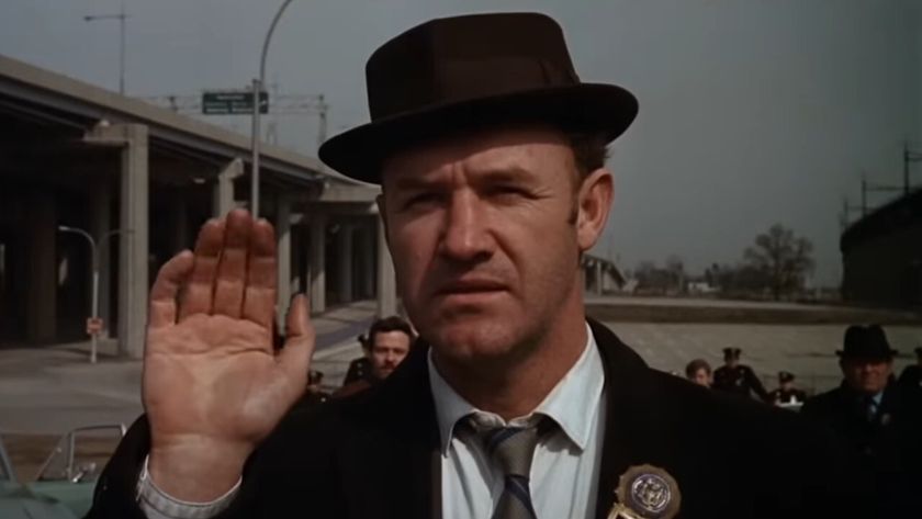 Gene Hackman waves goodbye in The French Connection. 