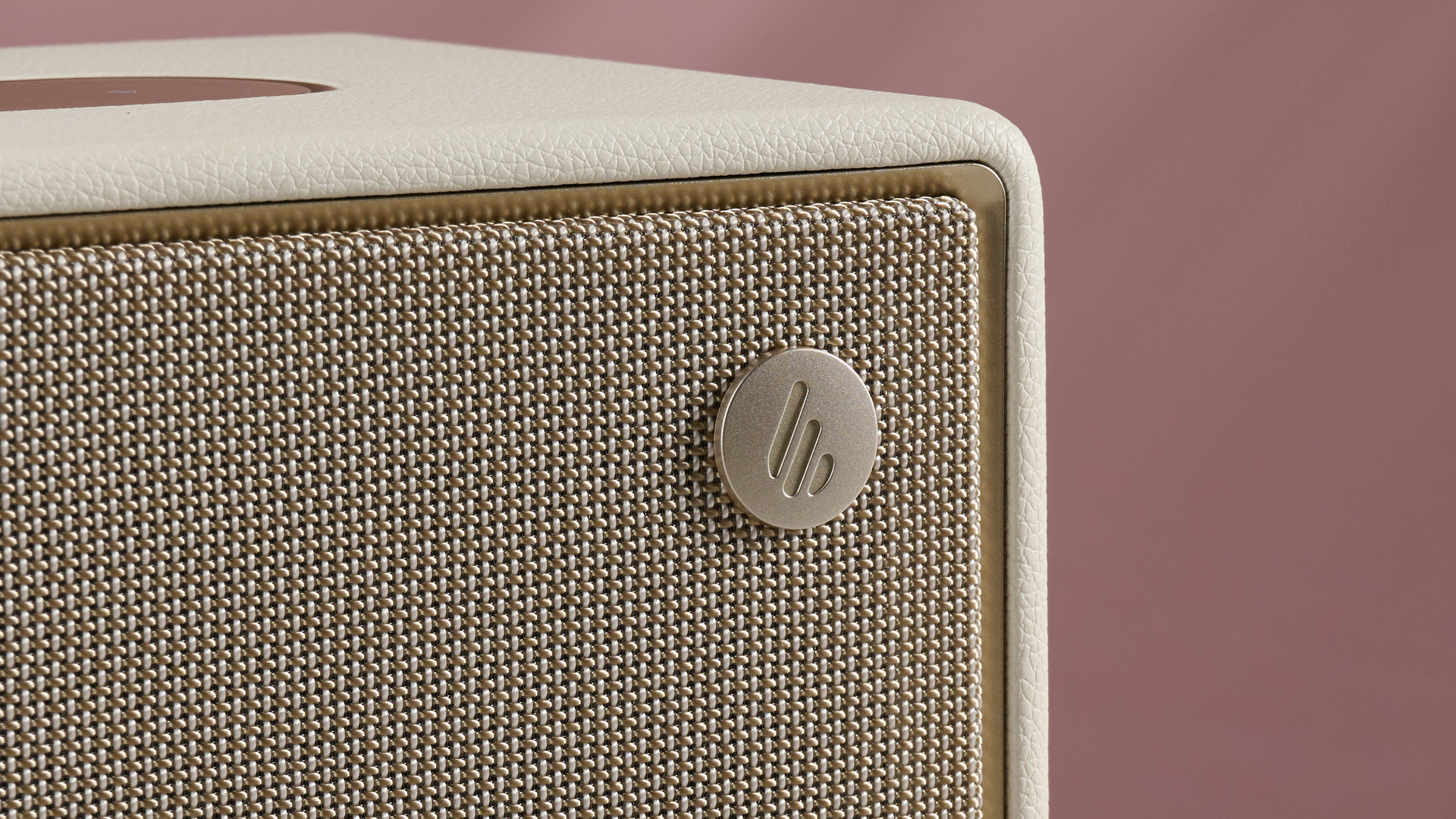 A closeup of the logo and speaker grille of the Edifier ES300.