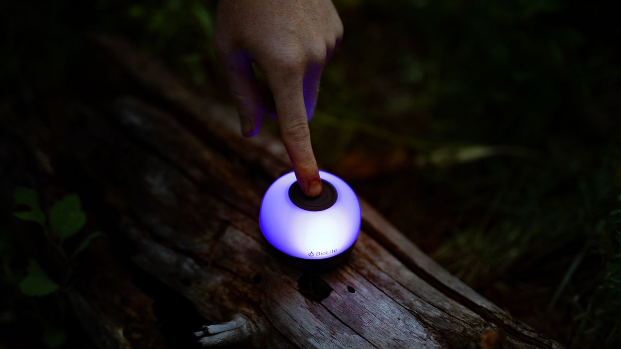 BioLite AlpenGlow Mini Lantern in use in a camping setting