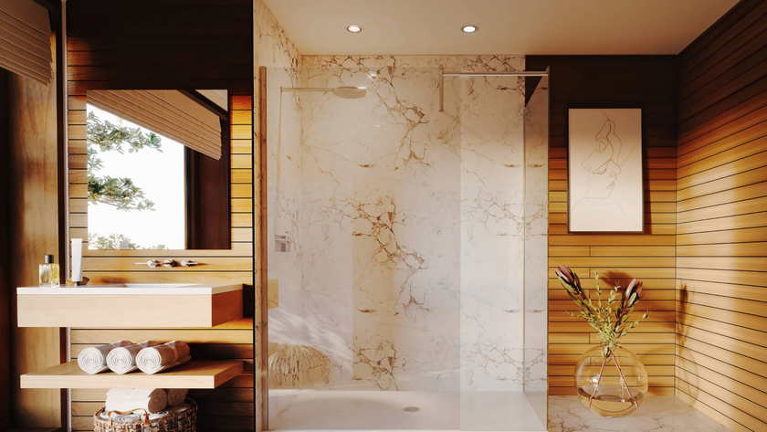 Wet room with wooden panelling and marble backdrop and floor
