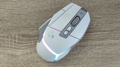 Logitech G502 X Plus review: white gaming mouse of wooden desk