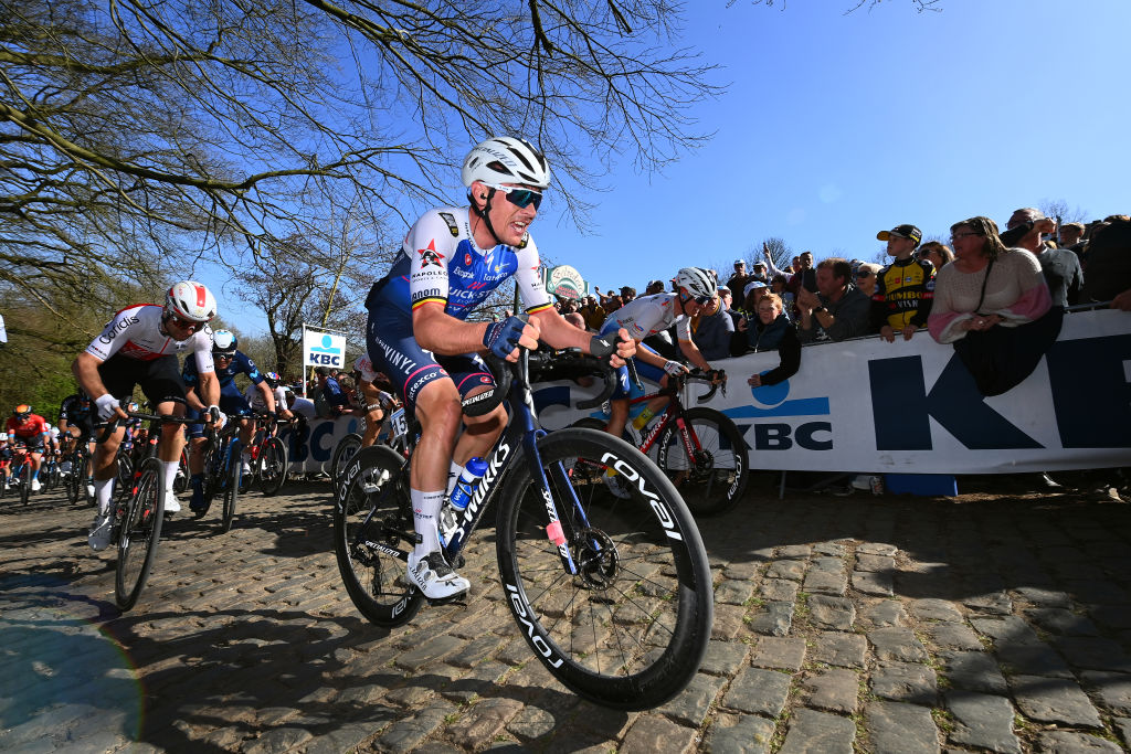WEVELGEM BELGIUM MARCH 27 Yves Lampaert of Belgium and Team QuickStep Alpha Vinyl competes through Kemmelbergweg cobblestones sector during the 84th GentWevelgem in Flanders Fields 2022 Mens Elite a 2488km one day race from Ypres to Wevelgem GWE22 WorldTour on March 27 2022 in Wevelgem Belgium Photo by Tim de WaeleGetty Images