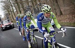Liquigas-Cannondale's Ted King works to pull Ivan Basso back into the race at Paris-Nice
