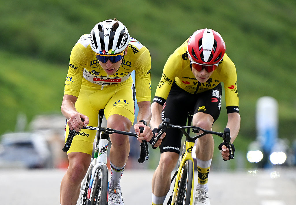 PLATEAU DU MONT-CENIS, FRANCE - JUNE 15: (L-R) Tadej Pogacar of Slovenia and UAE Team Emirates - XRG - Yellow leader jersey and Jonas Vingegaard of Denmark and Team Visma | Lease a Bike compete in the chase group during the 77th Criterium du Dauphine 2025, Stage 8 a 133.3km stage from Val-d'Arc to Plateau du Mont-Cenis 2095m / #UCIWT / on June 15, 2025 in Plateau du Mont-Cenis, France. (Photo by Dario Belingheri/Getty Images)