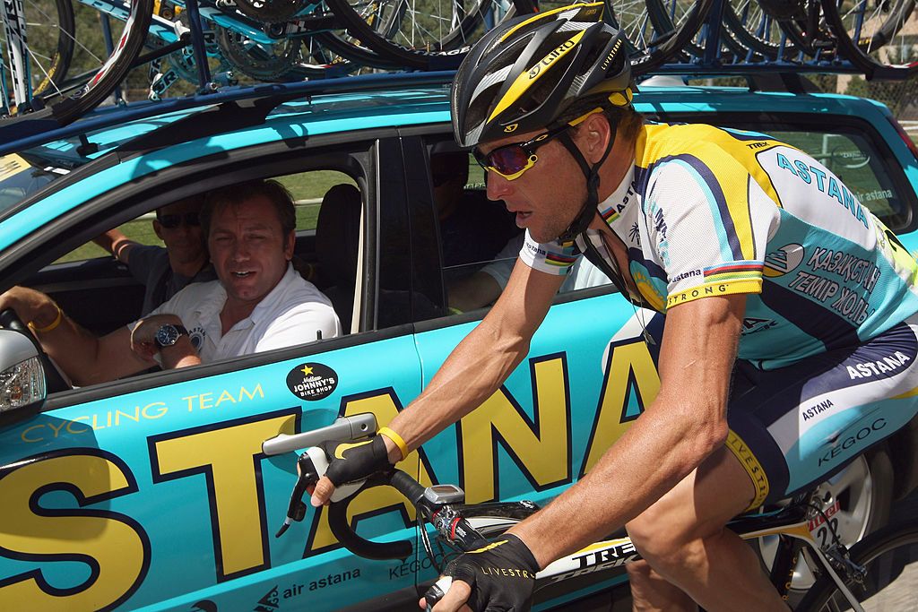 Lance Armstrong talks to team Manager Johan Bruyneel on stage 20 of the 2009 Tour de France from Montelimar to Mont Ventoux on July 25, 2009 on Mont Ventoux, France. (Photo by Bryn Lennon/Getty Images)