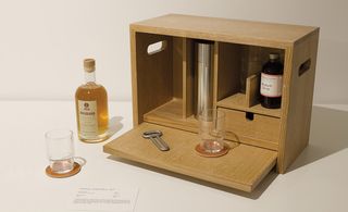 Small wooden box with alcohol