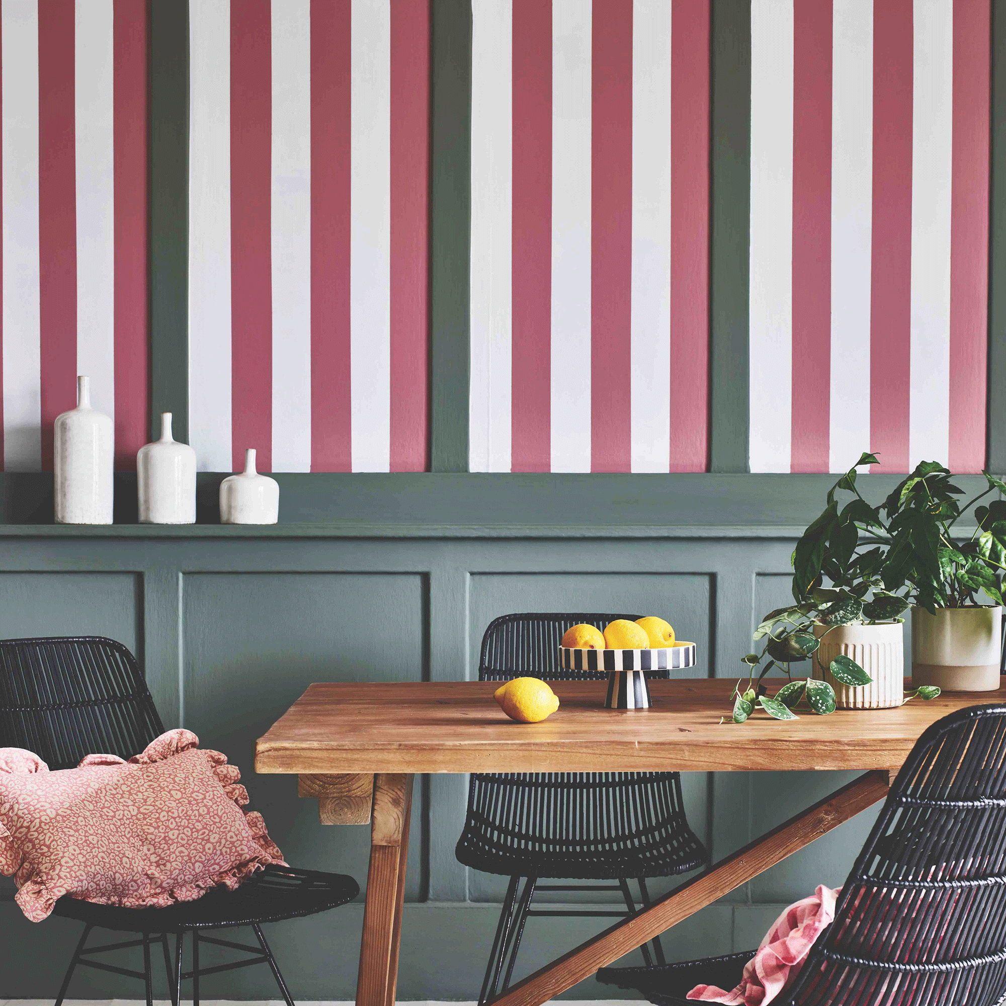 Pink and white striped walls with green panelling