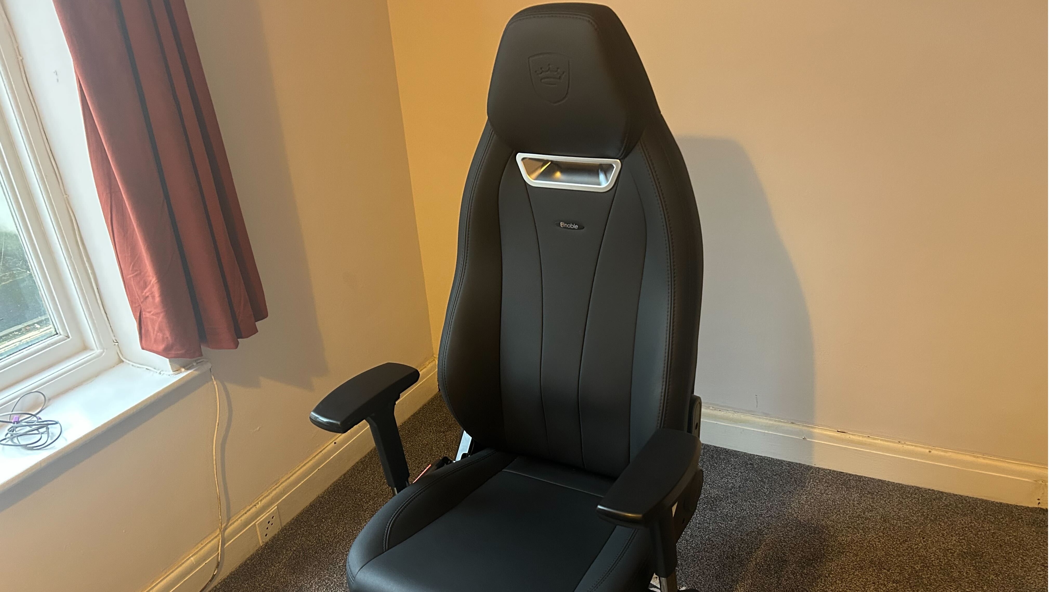 A Noblechairs Legend review image showing the tall backrest of the chair
