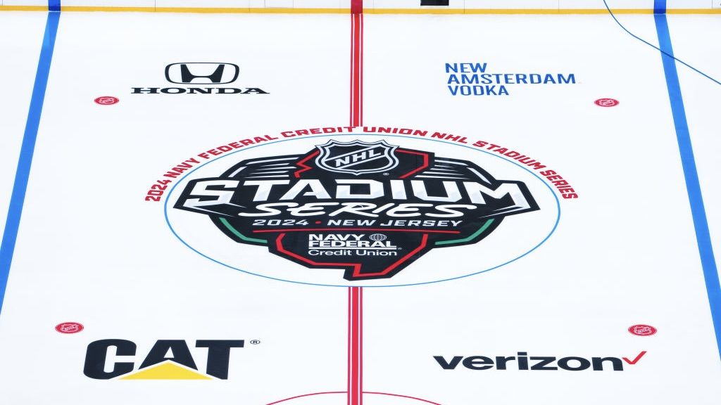 The lines and logos are placed down on the ice in preparation for the 2024 Navy Federal Credit Union NHL Stadium Series at MetLife Stadium on February 11, 2024 in East Rutherford, New Jersey.